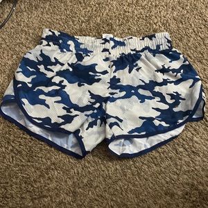 It is a pair of blue and white camo shorts with built in panties